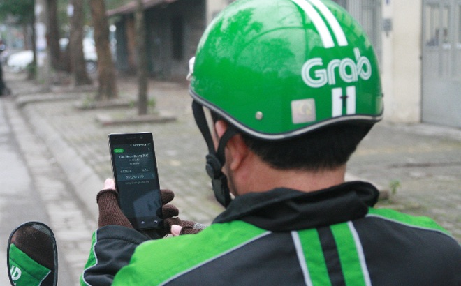 TP.HCM: Tài xế GrabBike bị hành hung tới mê sảng TP.HCM: Tài xế GrabBike bị hành hung tới mê sảng