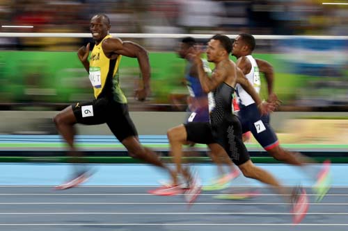 Usain Bolt nhàn nhã vào CK 200m điền kinh Olympic - 4
