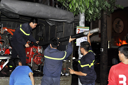 tphcm: trang dem hut nuoc cuu ham cao oc sau mua lich su - 12