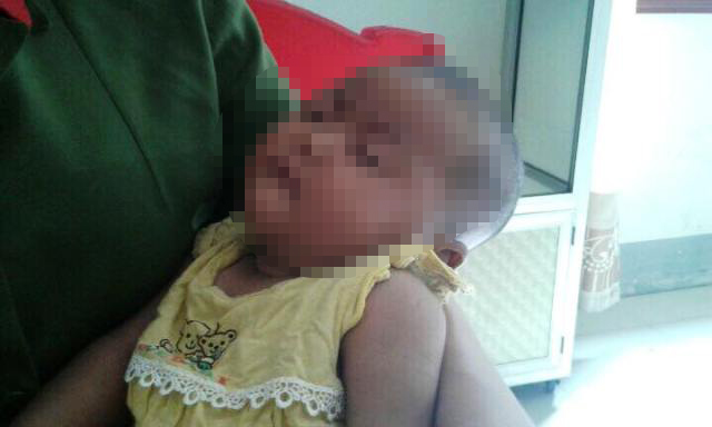 Giải cứu bé 4 tháng tuổi bị "mẹ mìn" bắt cóc từ Nam ra Bắc - 2