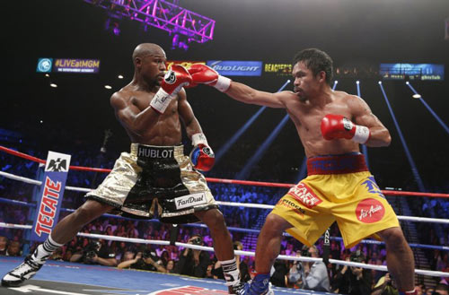 Mayweather sẽ tái đấu Pacquiao vì không thể chê tiền - 1