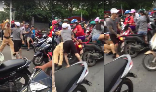 Thanh niên xăm trổ rút dao tấn công CSGT Nha Trang Thanh niên xăm trổ rút dao tấn công CSGT Nha Trang