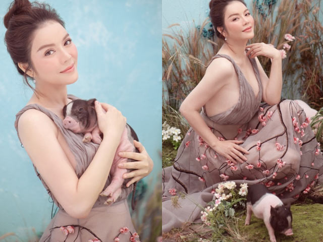 Lý Nhã Kỳ chụp ảnh Tết độc đáo cùng heo con, khoe vẻ đẹp nõn nà