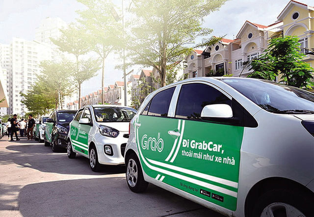 Tăng trưởng quá mạnh, Grab, Uber lại “gây phiền”? - 1