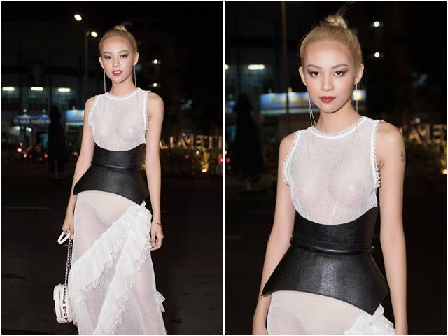 Phí Phương Anh mặc váy trong suốt đi xem thời trang